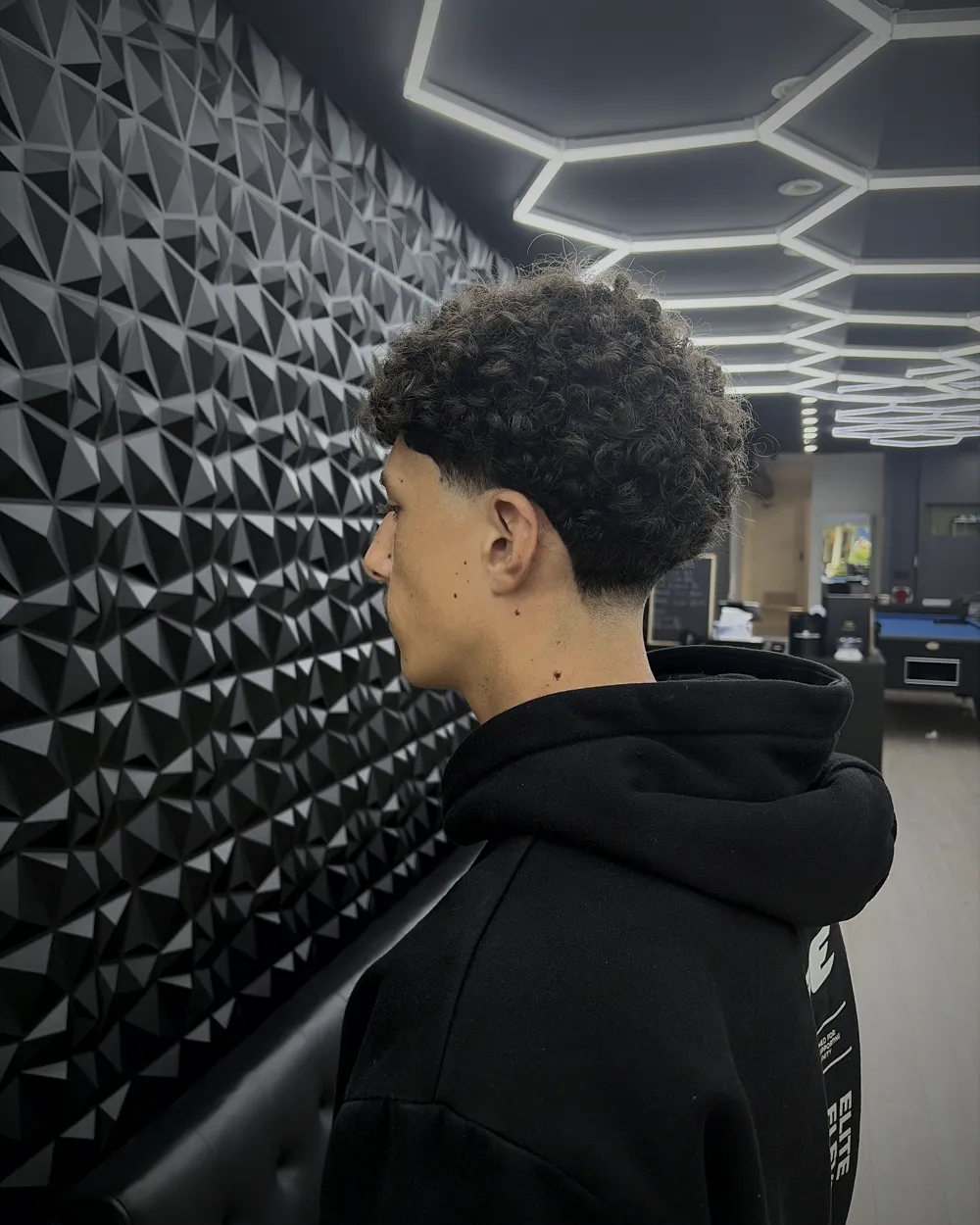 Curly top with a tight taper